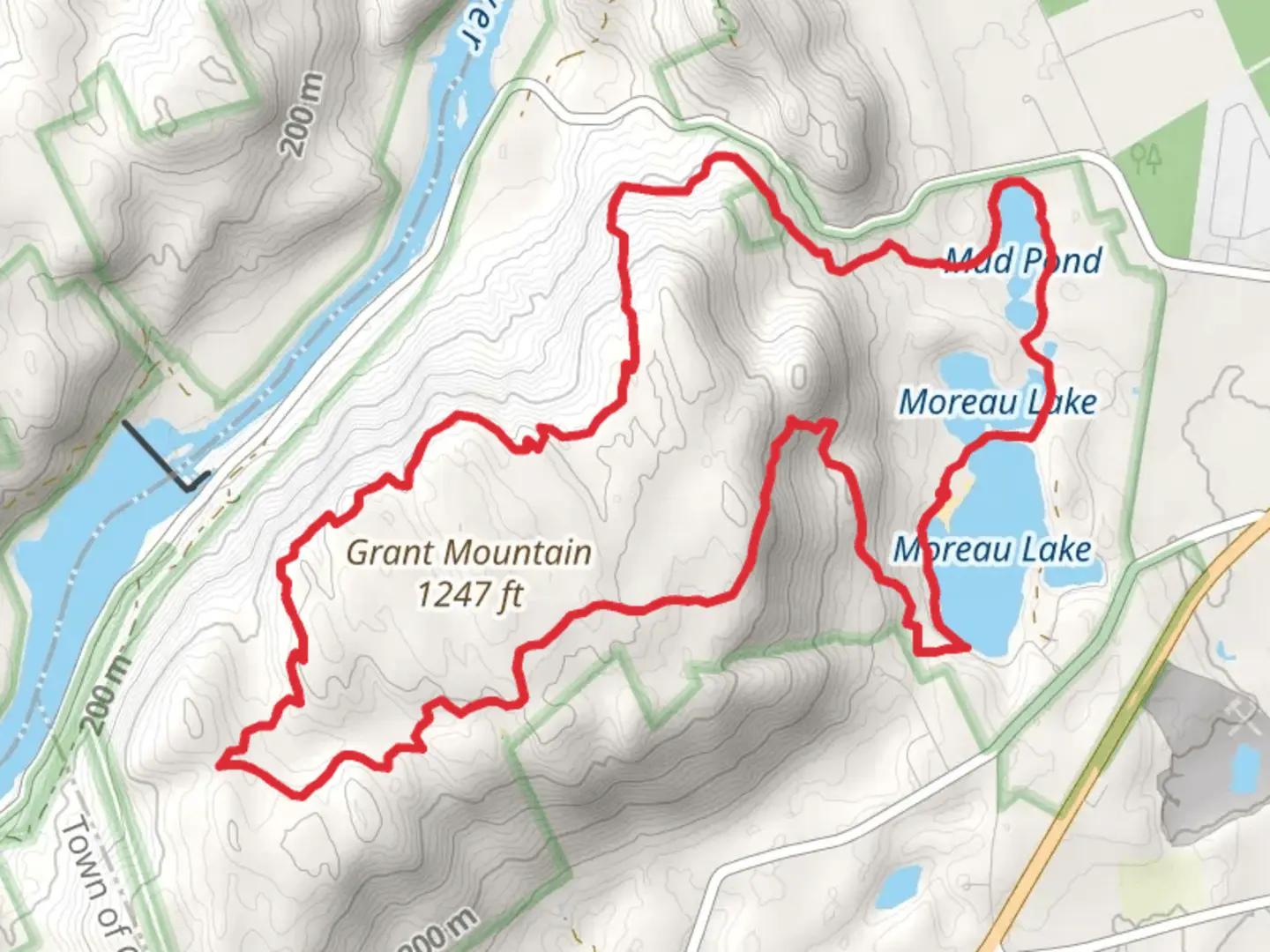 An image depicting the trail Grant Mountain, Moreau Lake and Mud Pond Loop and its surrounding area.