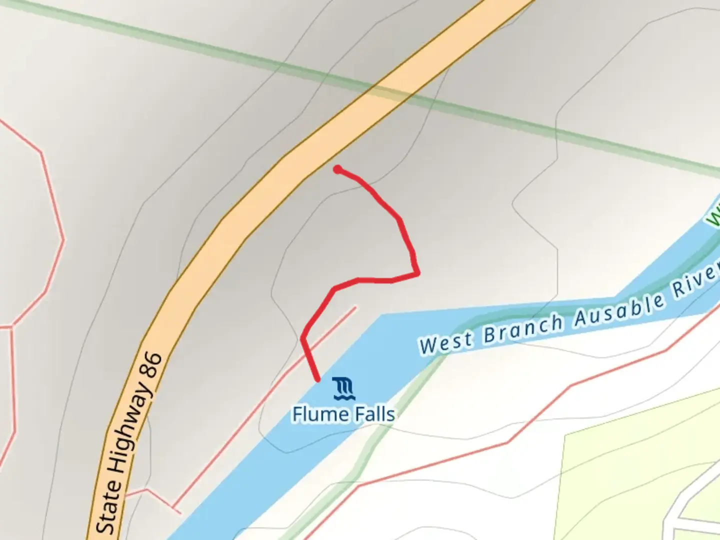 An image depicting the trail State Highway 86 to West Branch Ausable River Trail and its surrounding area.