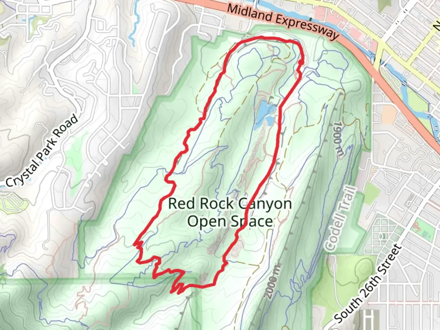 An image depicting the trail Red Rock Open Space - Roundup Loop Trail and its surrounding area.