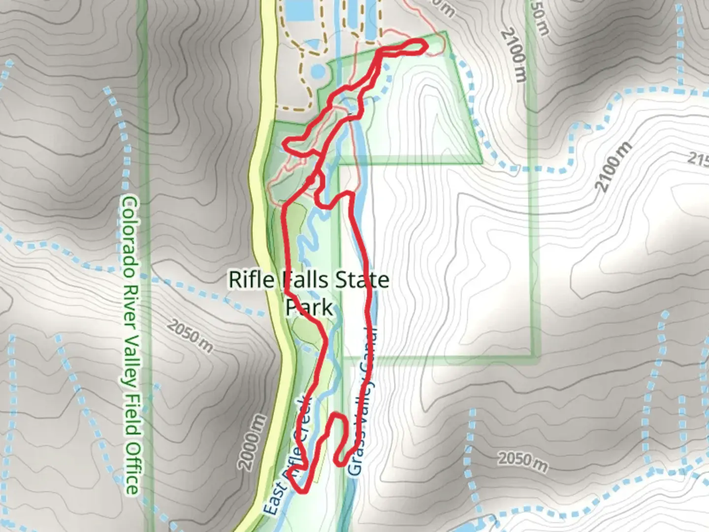 An image depicting the trail Rifle Falls State Park Loop and its surrounding area.