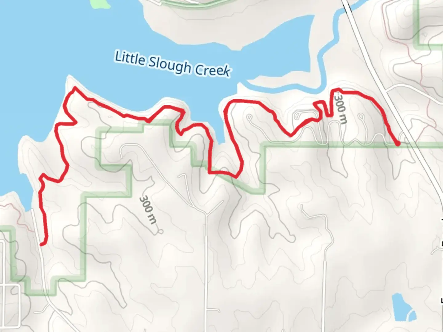 An image depicting the trail Little Slough Creek Out and Back and its surrounding area.