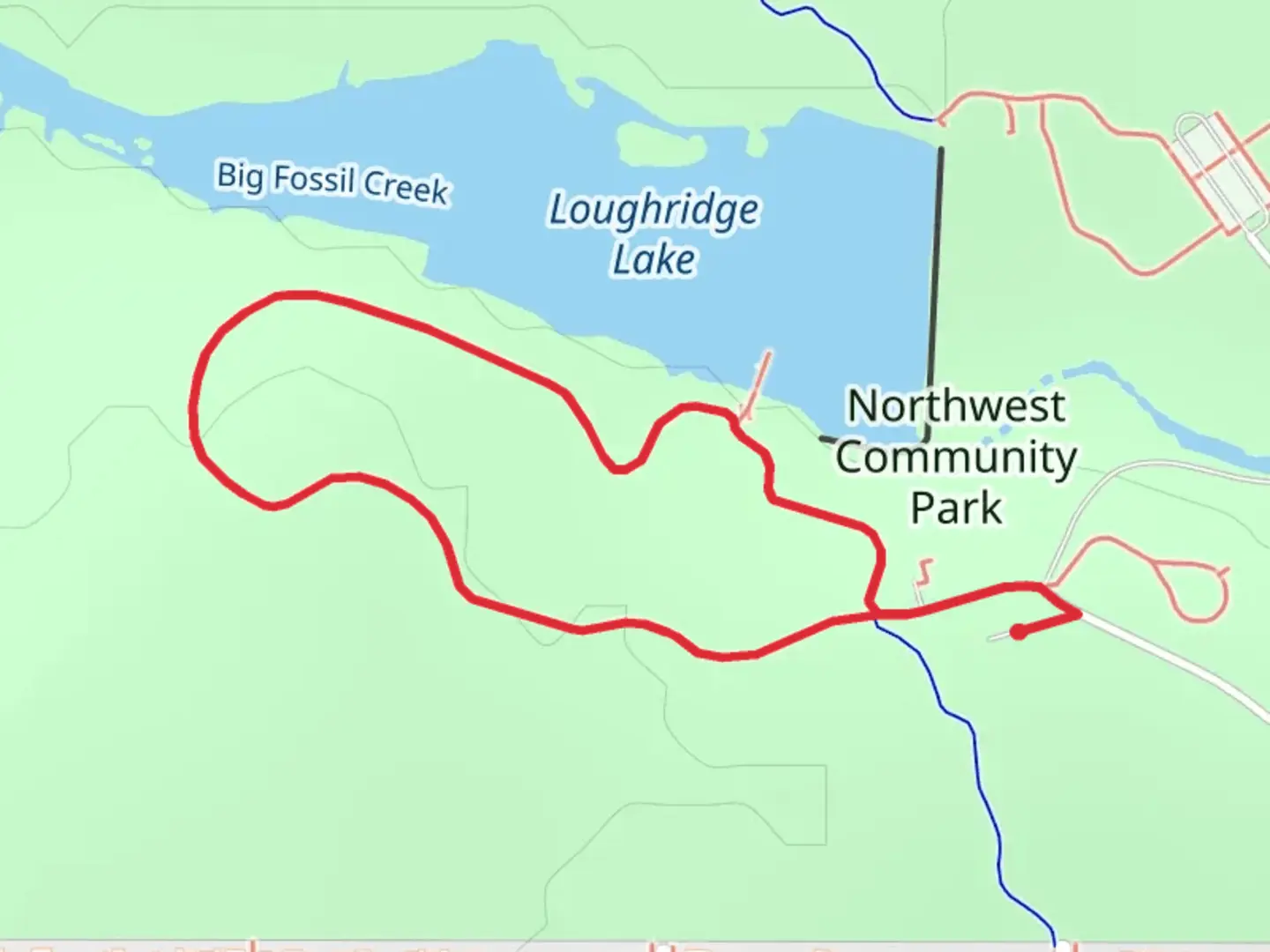 An image depicting the trail Northwest Community Park Loop and its surrounding area.