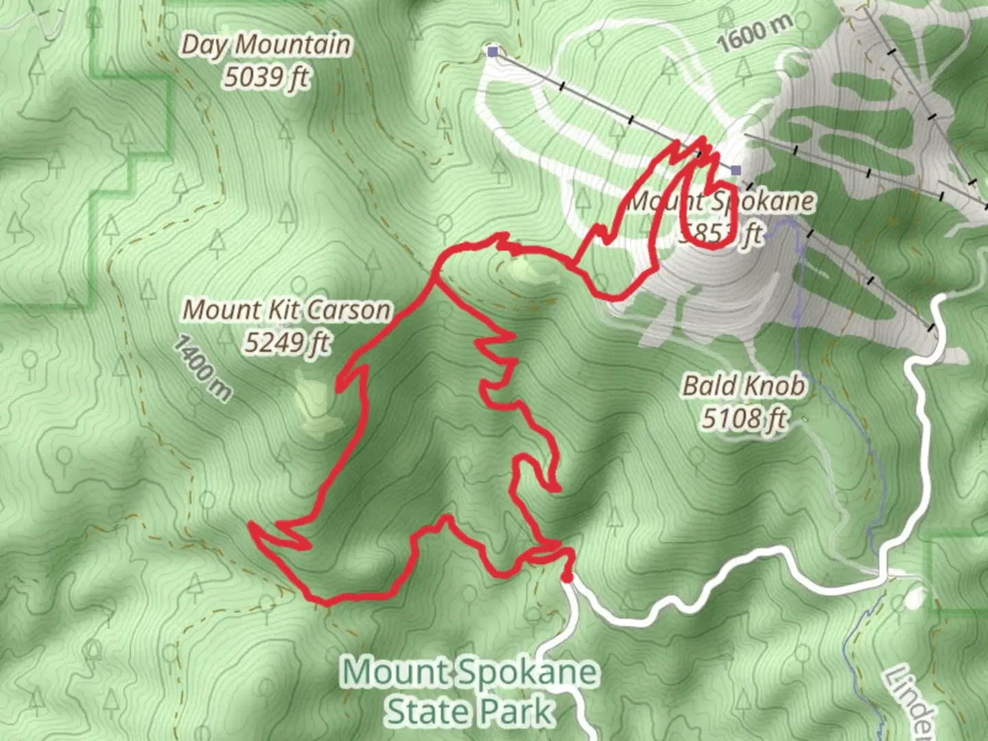 An image depicting the trail Mount Spokane via Trail 140 and its surrounding area.