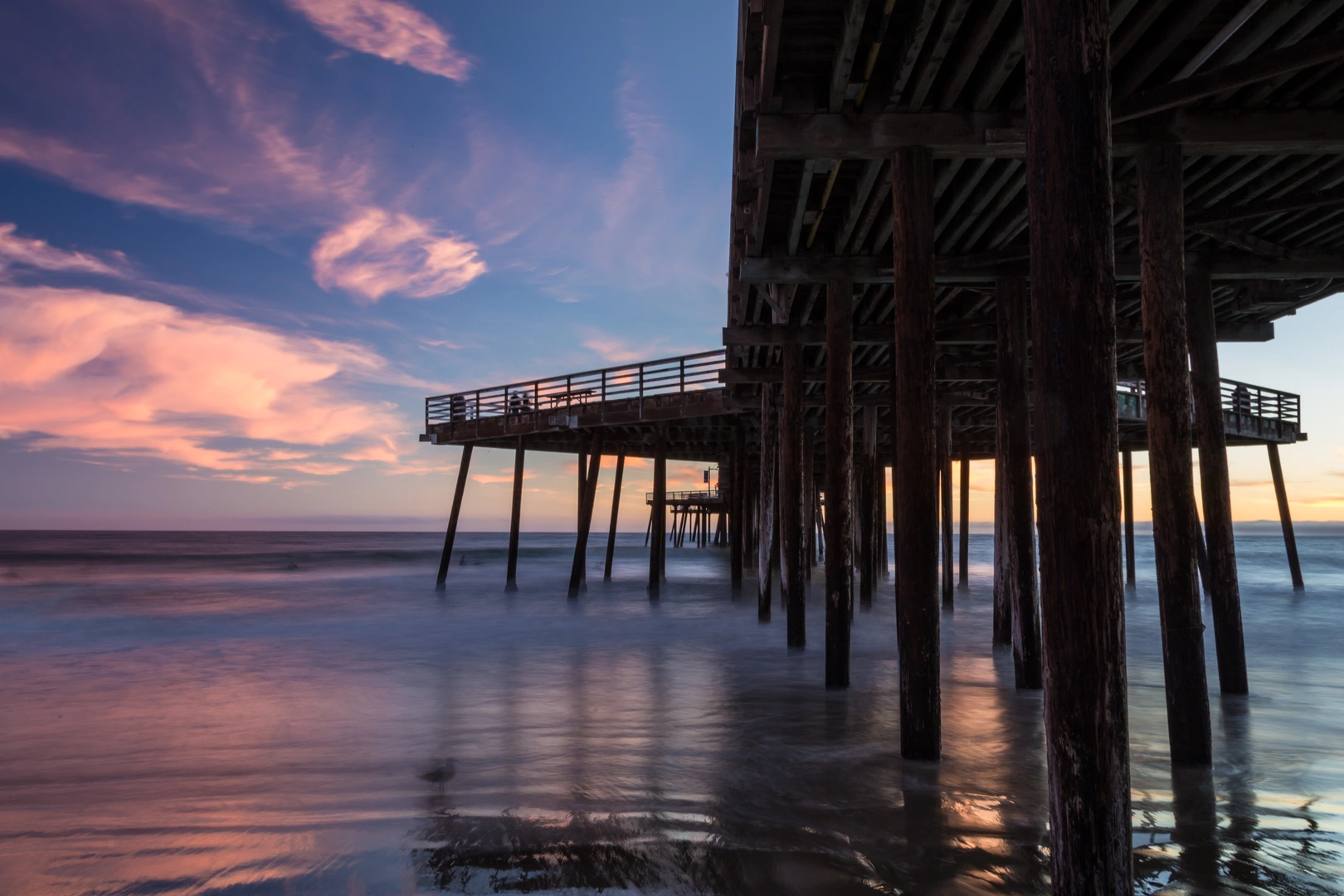 An image depicting the trail Juan Batista De Anza Trail and Pismo Beach Pier and its surrounding area.