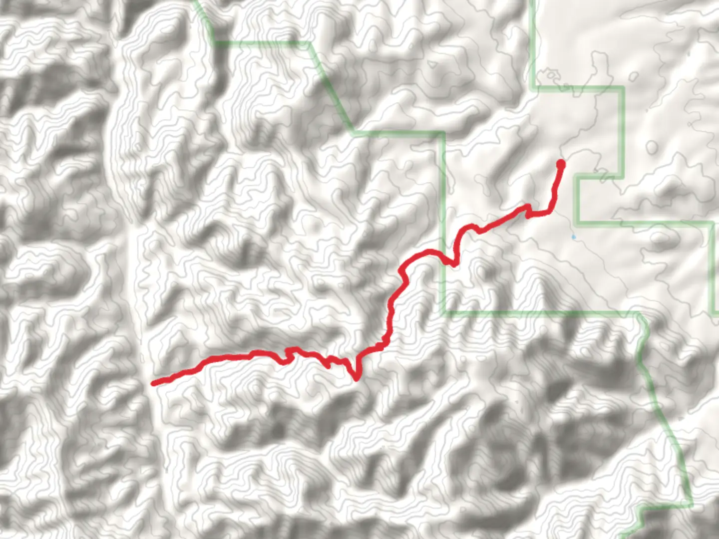 An image depicting the trail Corral Canyon via East Divide Trail and its surrounding area.