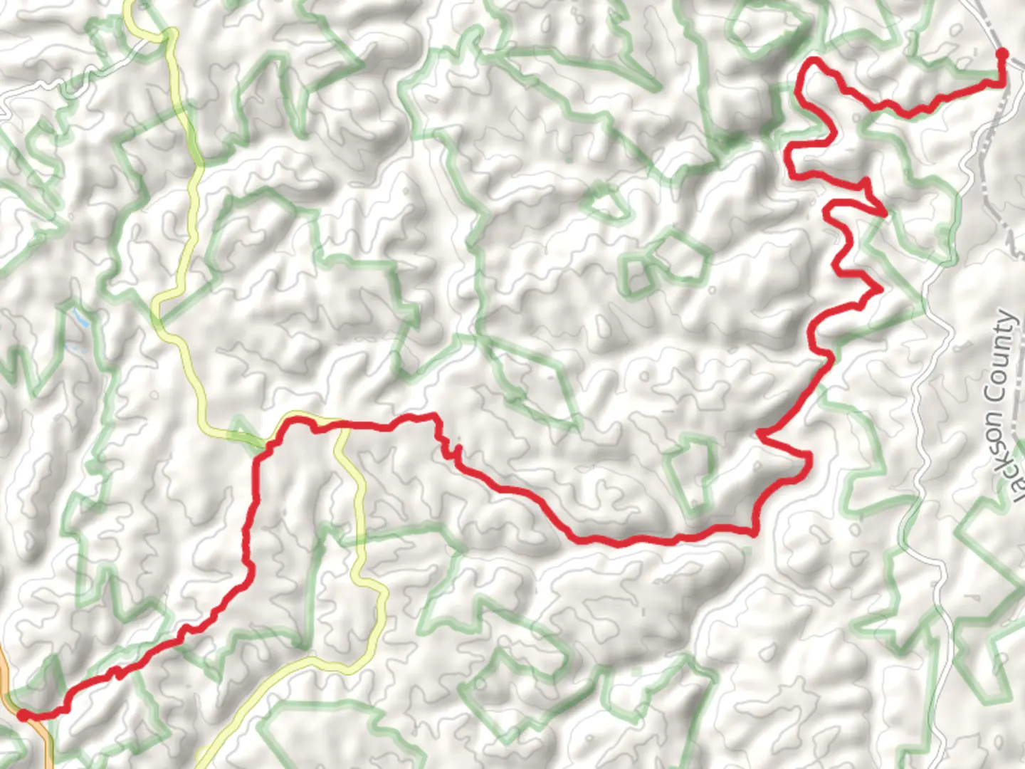 An image depicting the trail Sheltowee Trace - Old Orchard Cemetery Road Point to Point and its surrounding area.