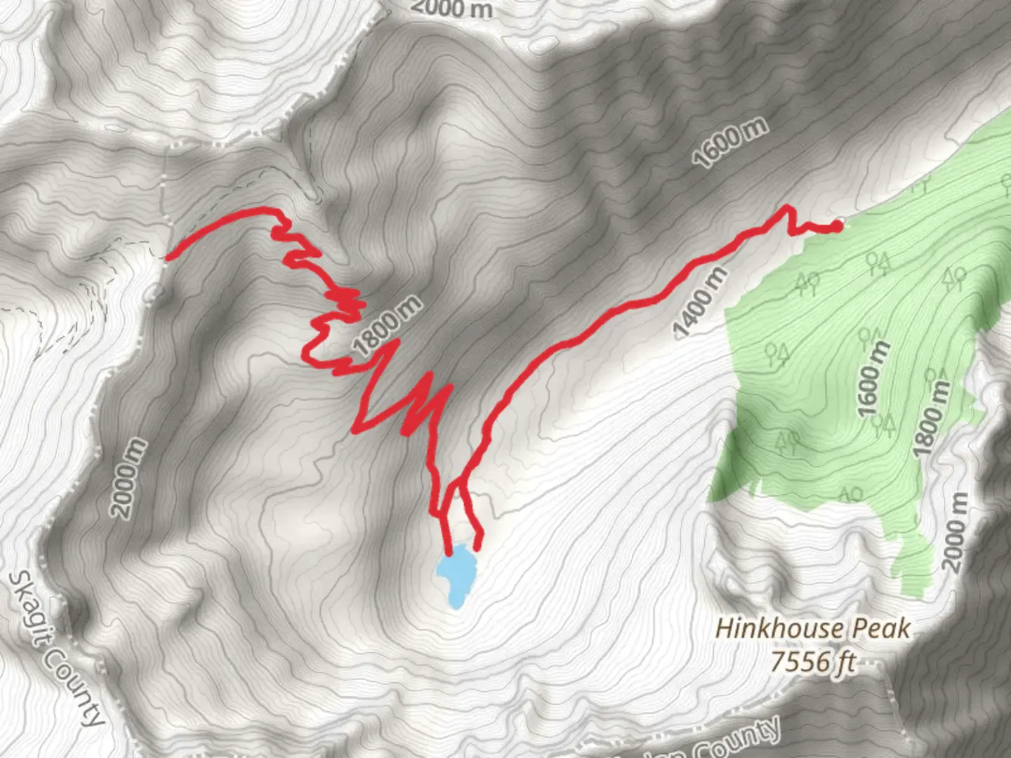 An image depicting the trail Cutthroat Pass and Cutthroat Lake via Cutthroat Creek Trail and its surrounding area.