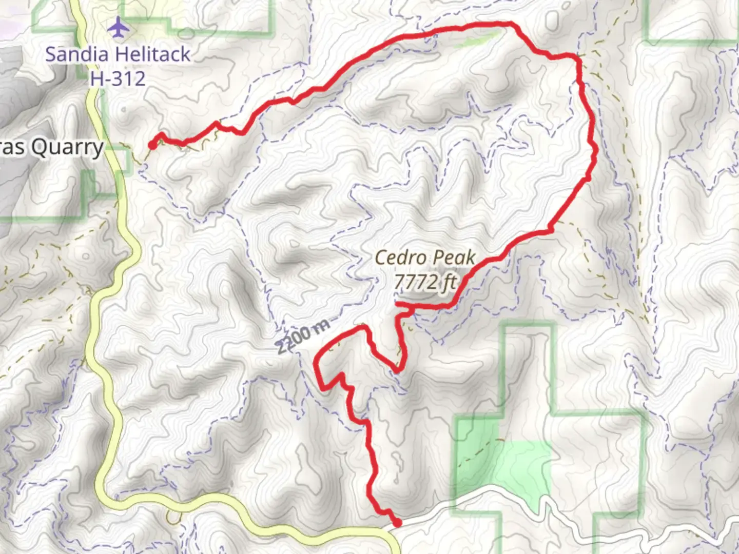 An image depicting the trail Cedro Peak via Forest Road and its surrounding area.