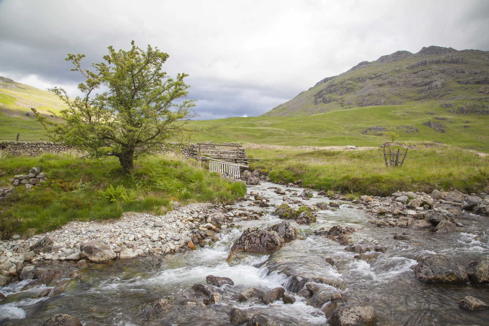 An image depicting the trail Five Trigs Loop Duddon Bridge and its surrounding area.