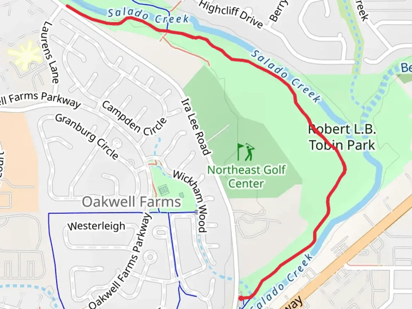 An image depicting the trail Robert L B Tobin Park and its surrounding area.