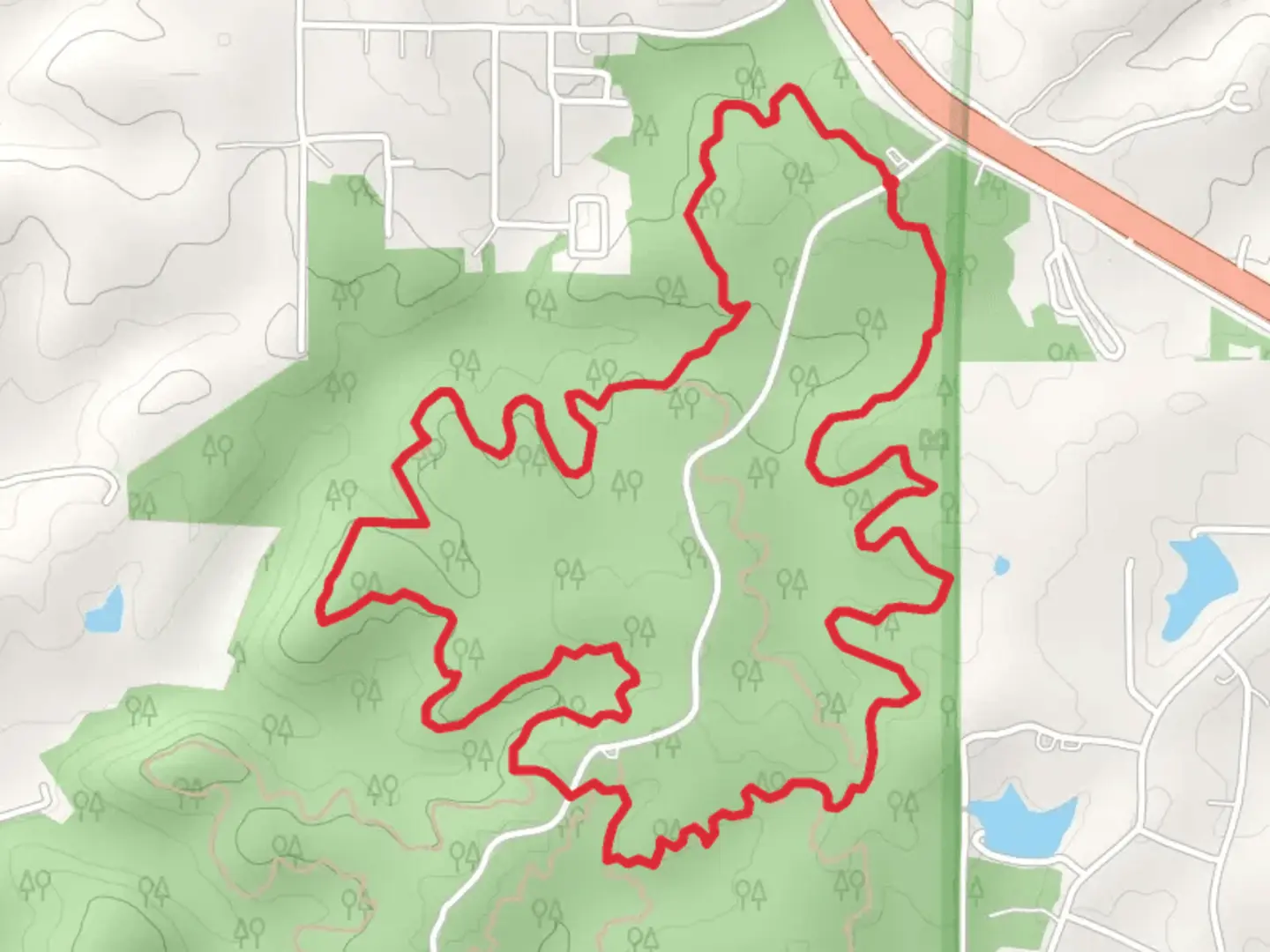 An image depicting the trail Wolf Creek Loop Trail from Outer Road and its surrounding area.