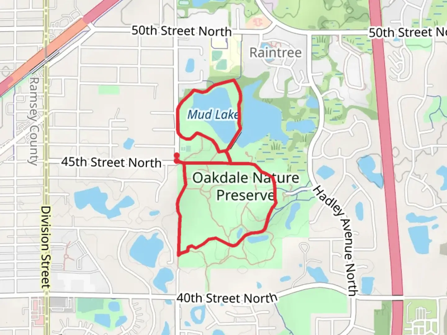 An image depicting the trail Oakdale Nature Preserve and Mud Lake Loop and its surrounding area.