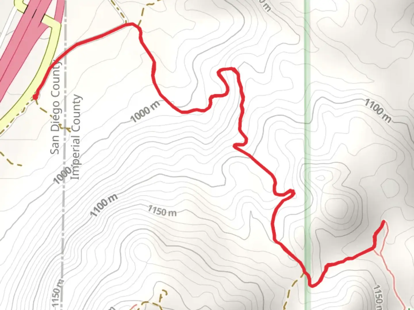 An image depicting the trail Smuggler's Den from Old Highway 80 and its surrounding area.