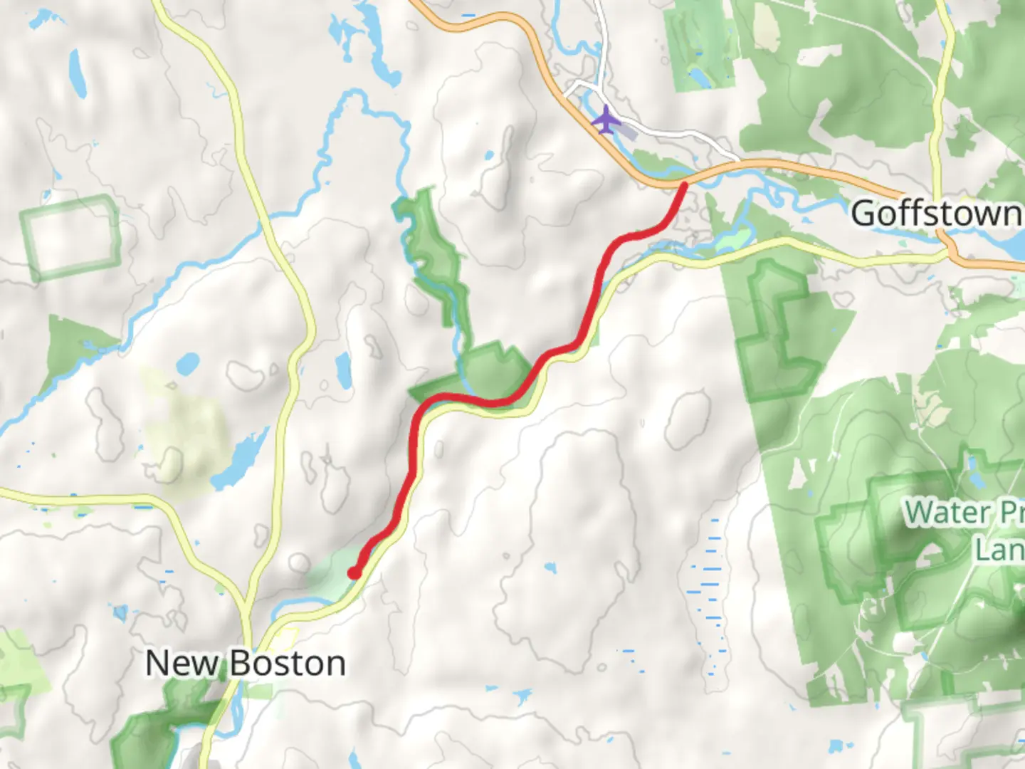 An image depicting the trail New Boston Rail Trail and its surrounding area.