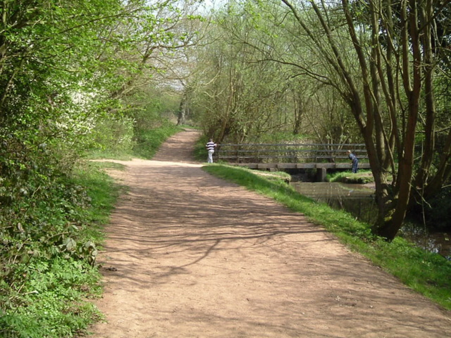 An image depicting the trail Bourn Brook Loop - Woodgate Valley Country Park and its surrounding area.