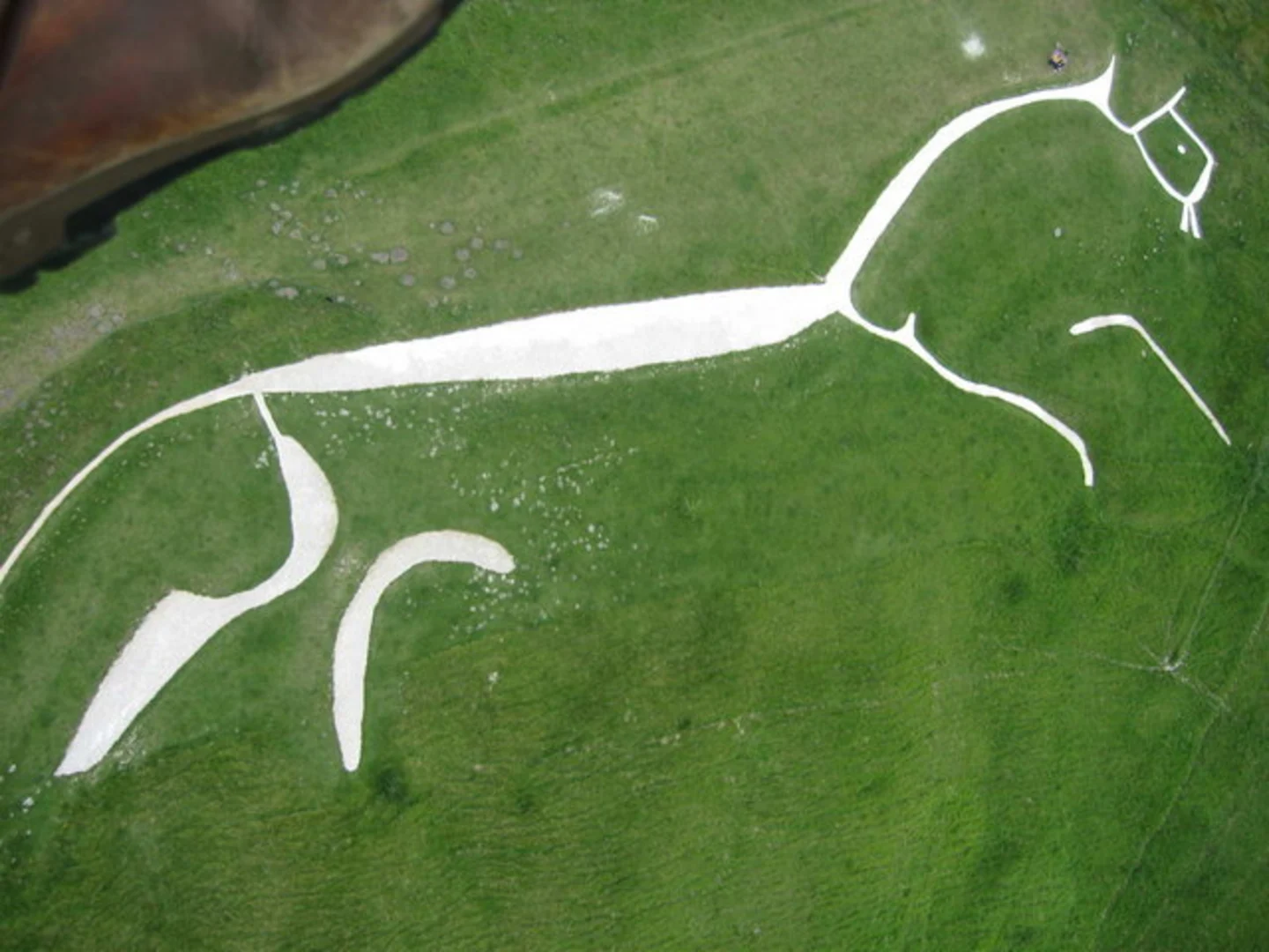 An image depicting the trail Uffington White Horse and its surrounding area.