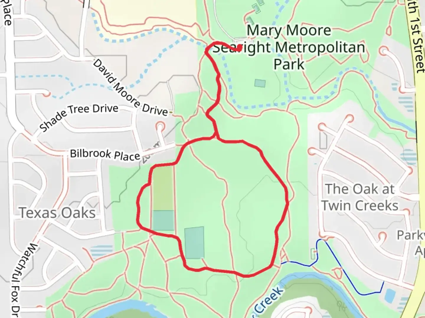 An image depicting the trail Mary Moore Searight Metro Park Loop Trail and its surrounding area.