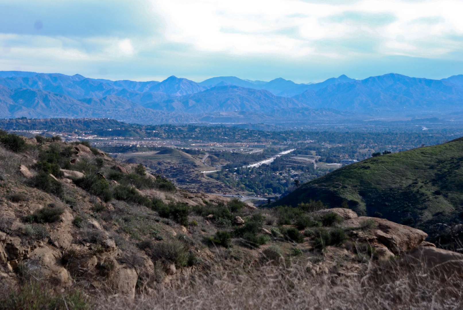An image depicting the trail Rocky Peak Trail from Ronald Reagan Freeway and its surrounding area.