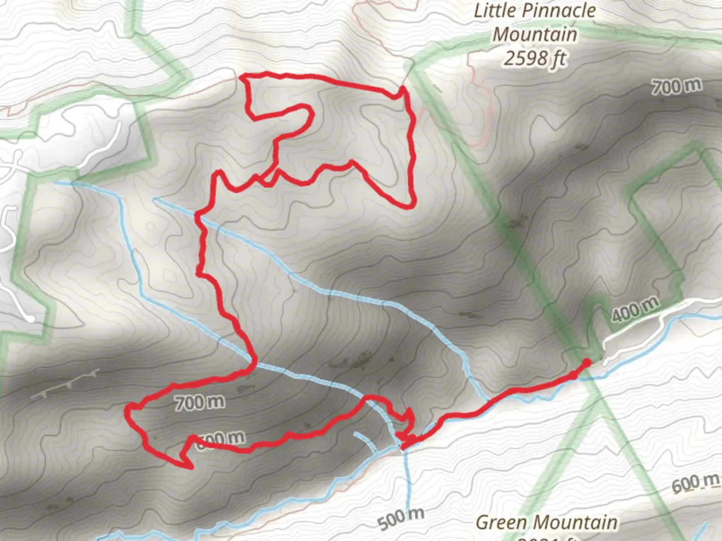 An image depicting the trail Oil Camp Creek and John Sloan Loop Trail and its surrounding area.