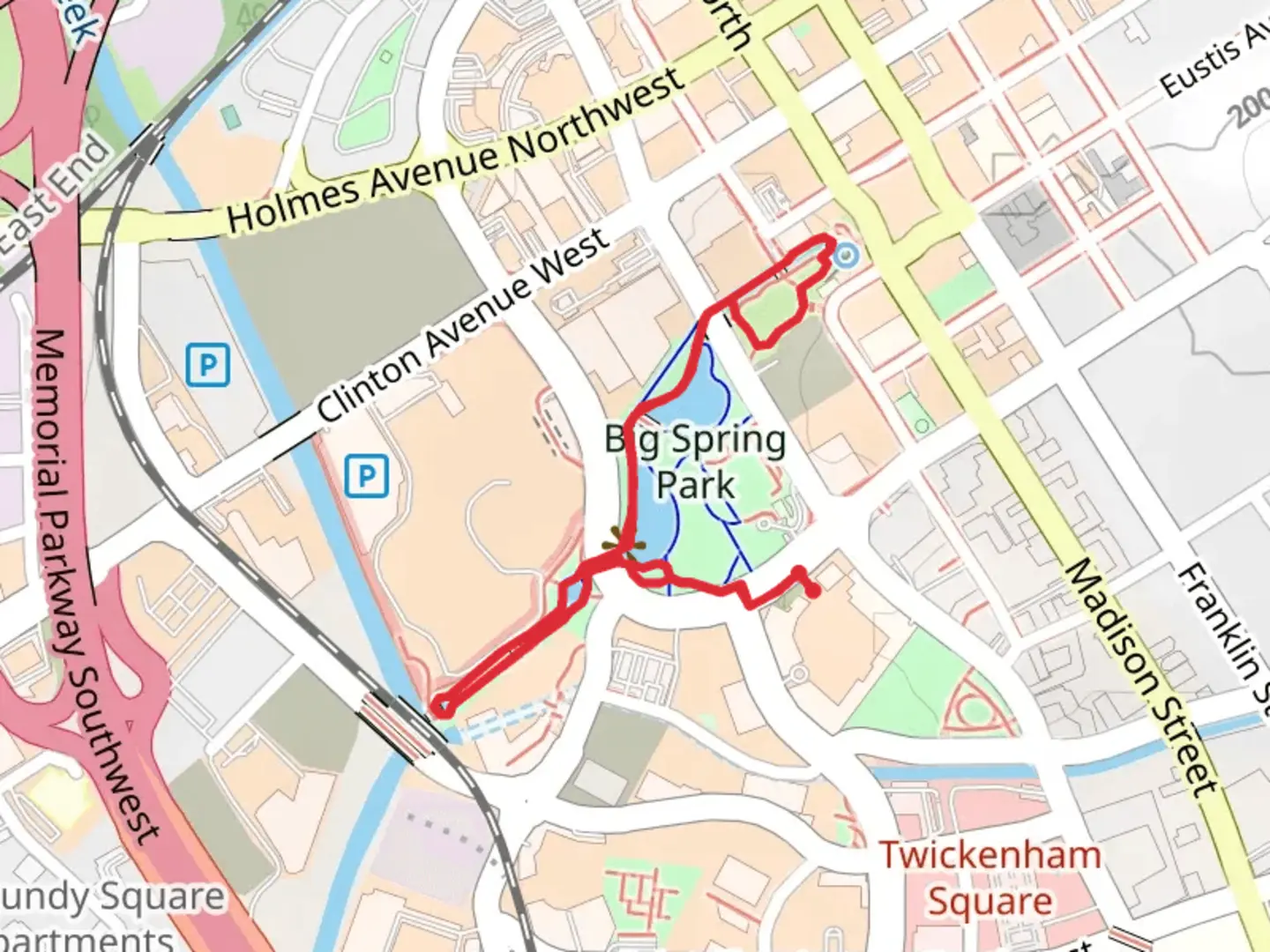 An image depicting the trail Big Spring Park Greenway and its surrounding area.