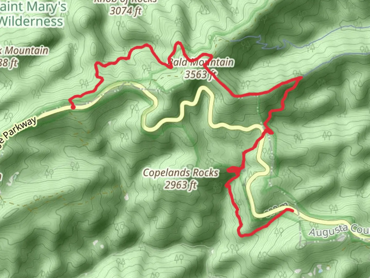 An image depicting the trail Bald Mountain Overlook to White Rock Falls Trail and its surrounding area.