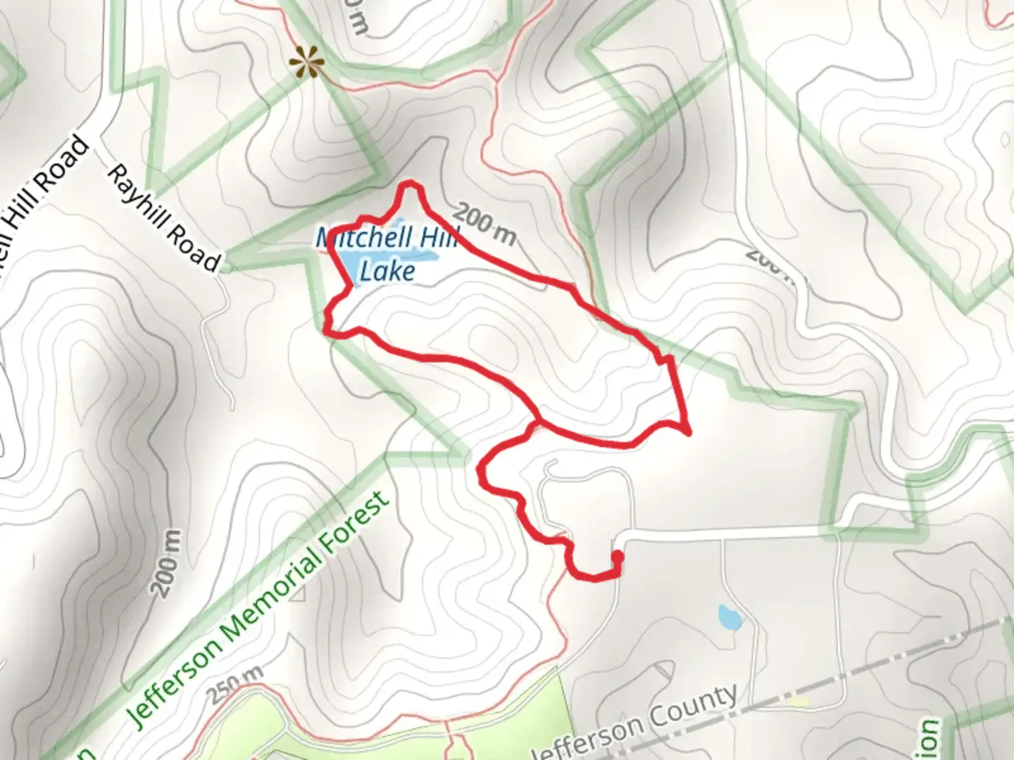 An image depicting the trail Mitchell Hill Lake Loop Trail and its surrounding area.