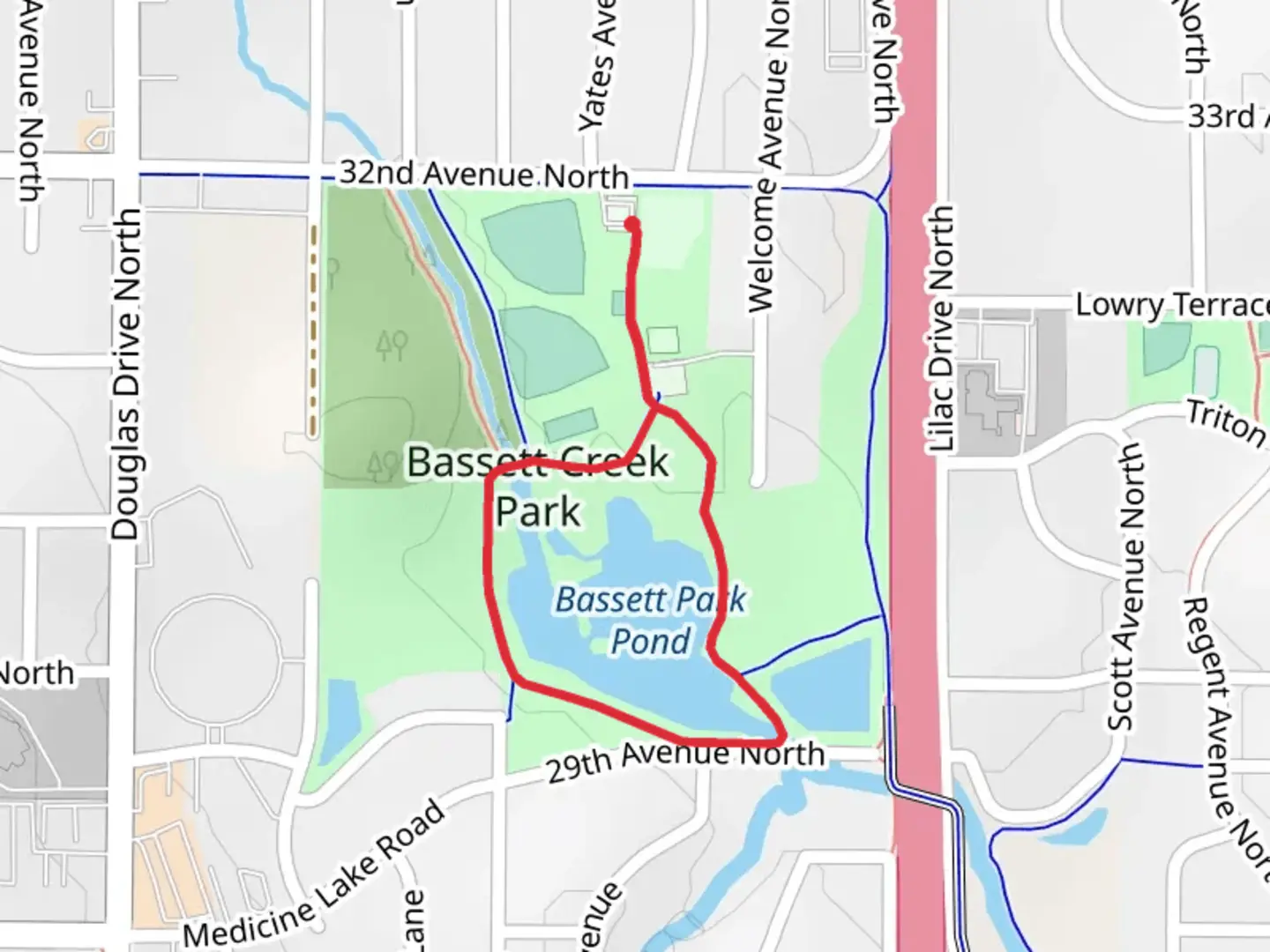 An image depicting the trail Bassett Creek Park and Pond Loop and its surrounding area.