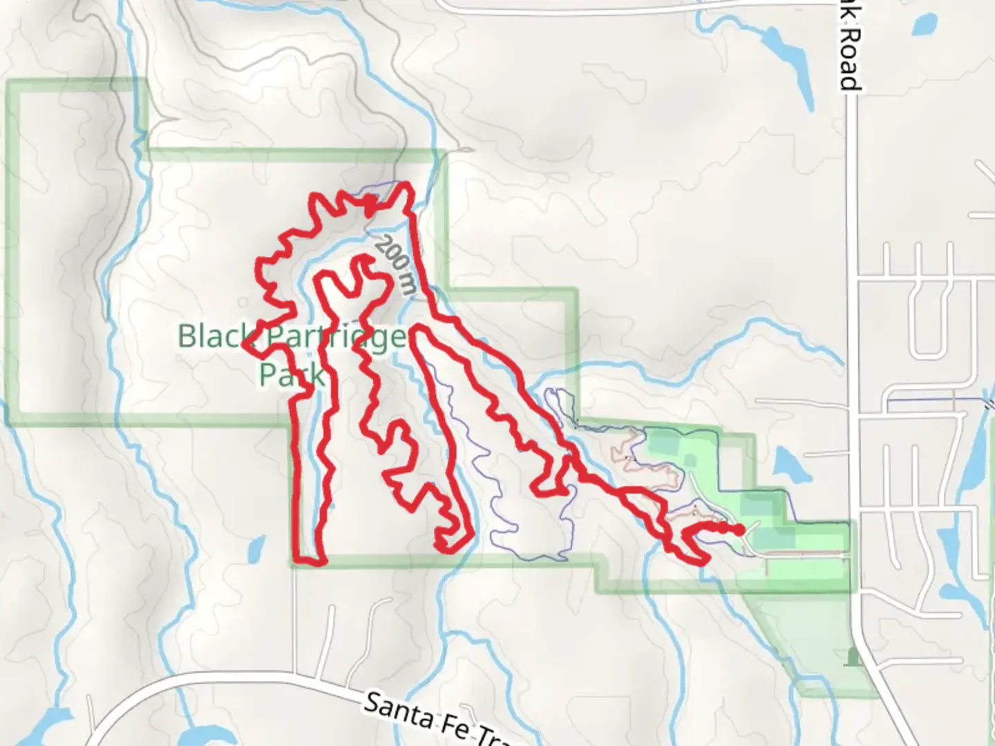 An image depicting the trail Black Partridge Park Loop and its surrounding area.