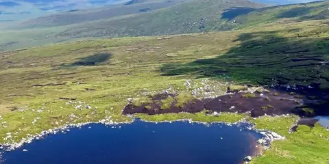 An image depicting the trail Mullaghcleevaun From Military Road and its surrounding area.