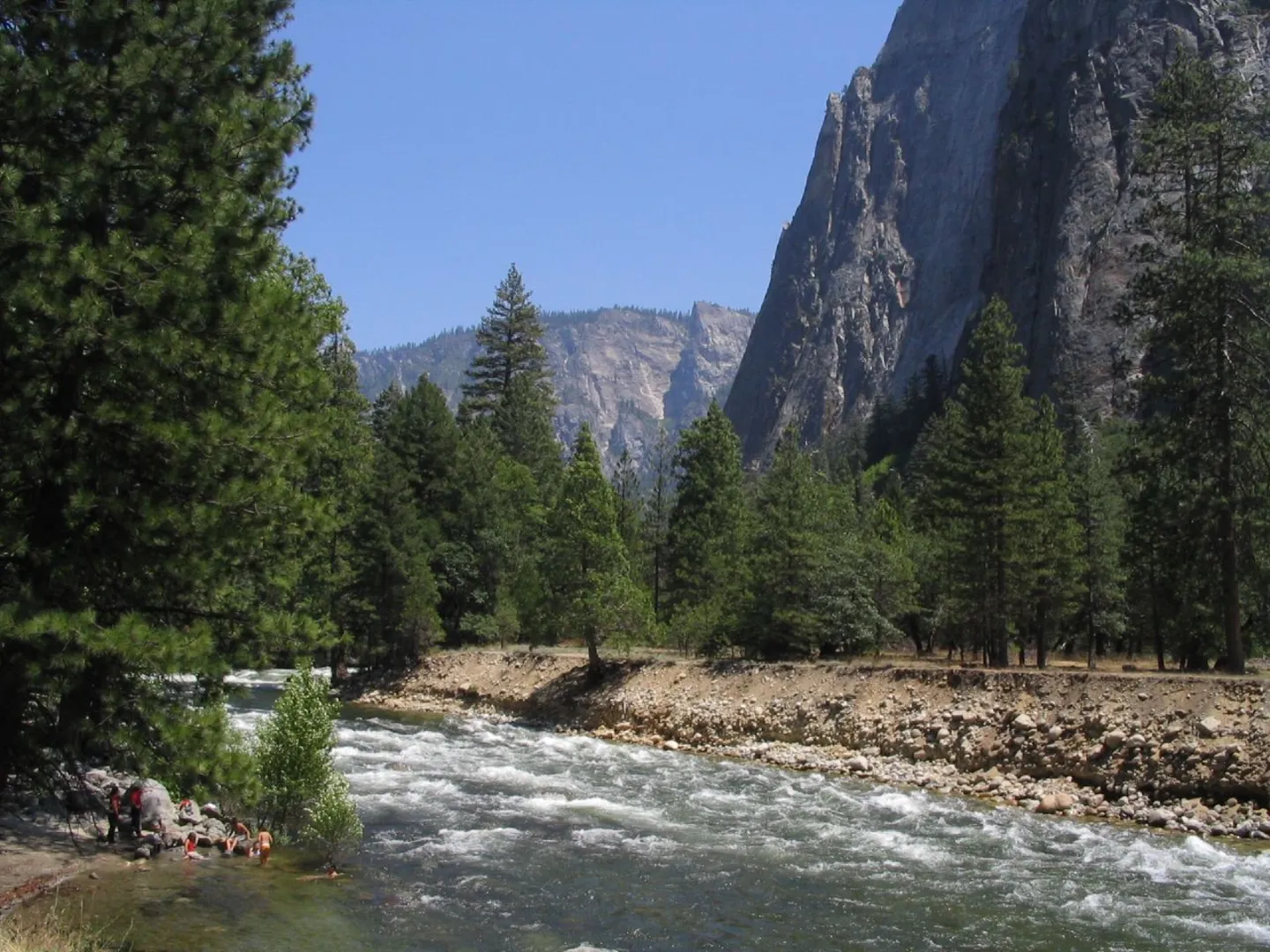 An image depicting the trail Merced River via John Muir Trail and its surrounding area.