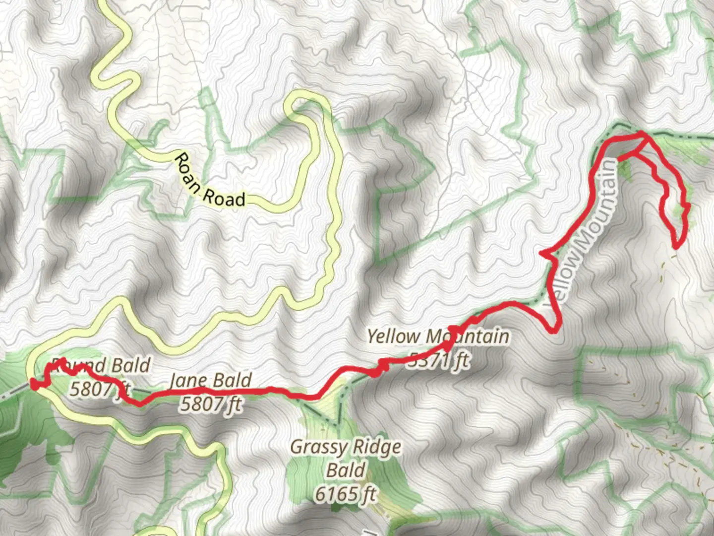 An image depicting the trail Round Bald, Yellow Mountain via Appalachian Trail and its surrounding area.