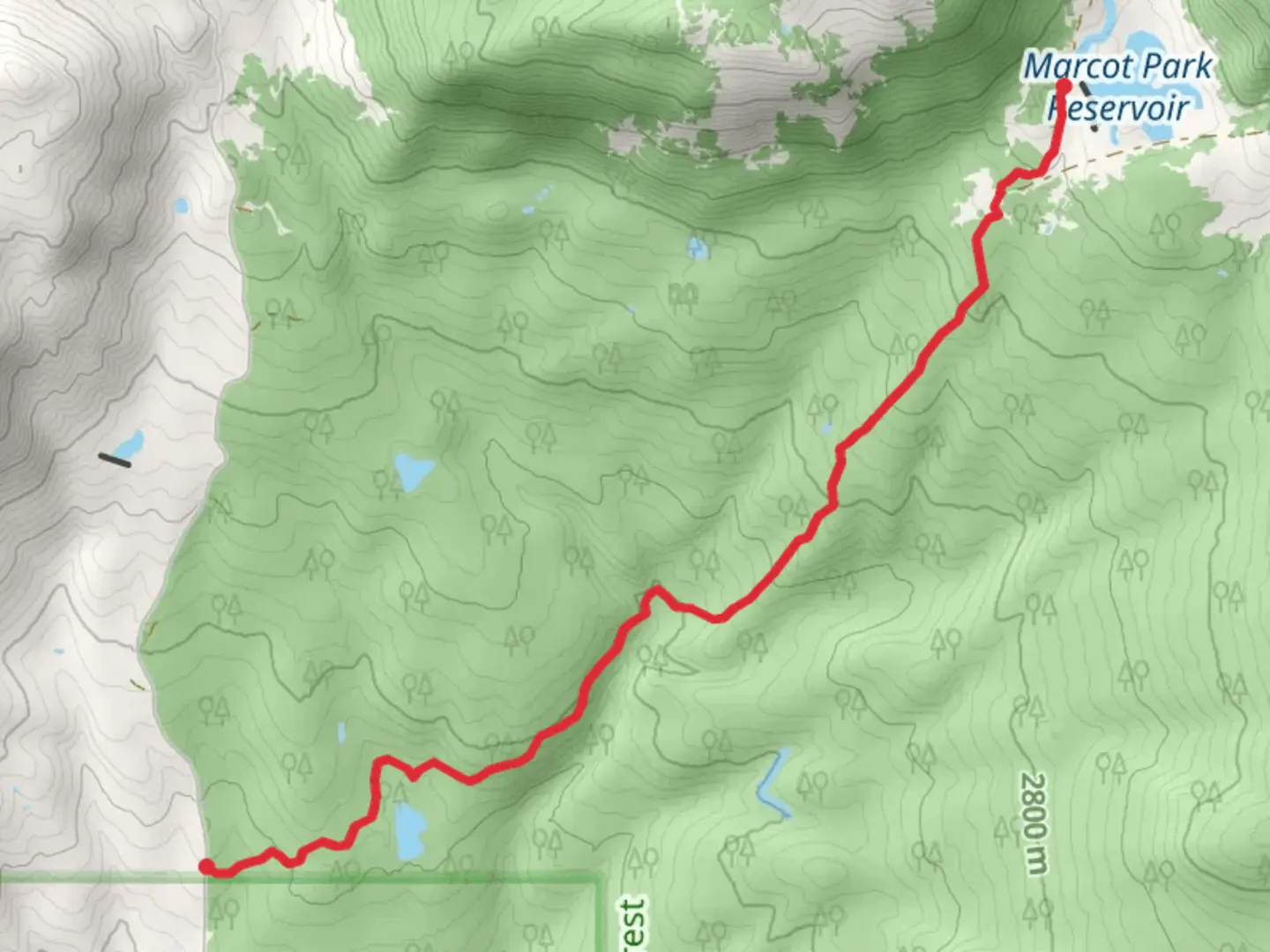 An image depicting the trail Marcot Park Reservoir via Forest Road 127 and its surrounding area.
