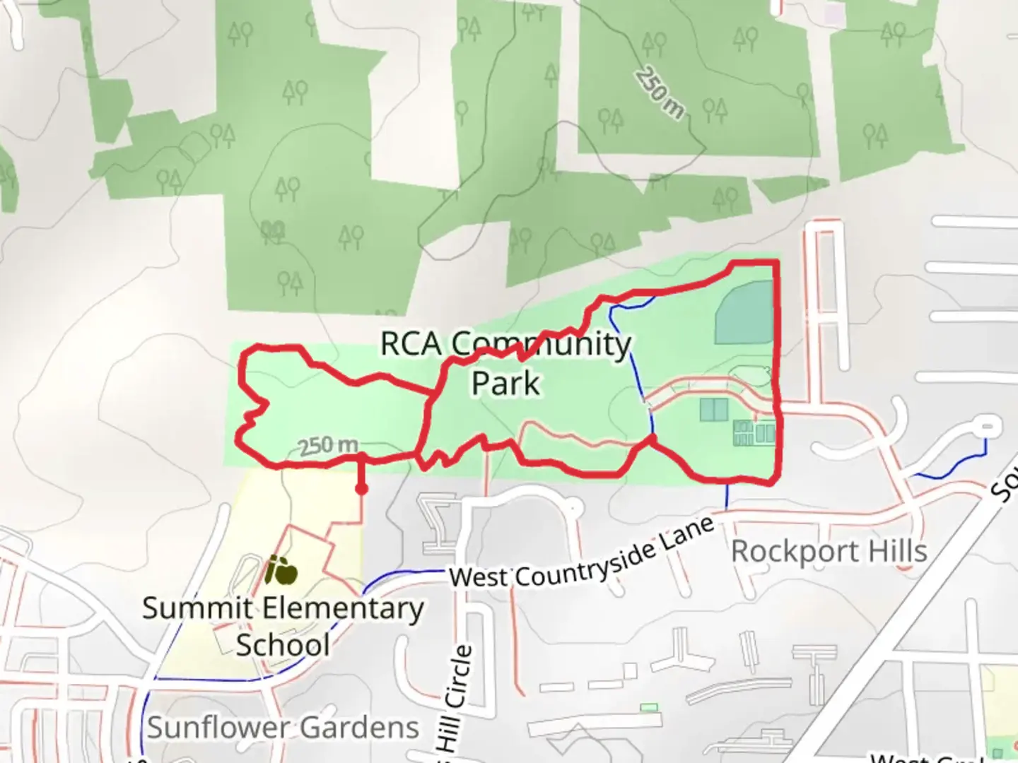 An image depicting the trail RCA Community Park Loop Path and its surrounding area.