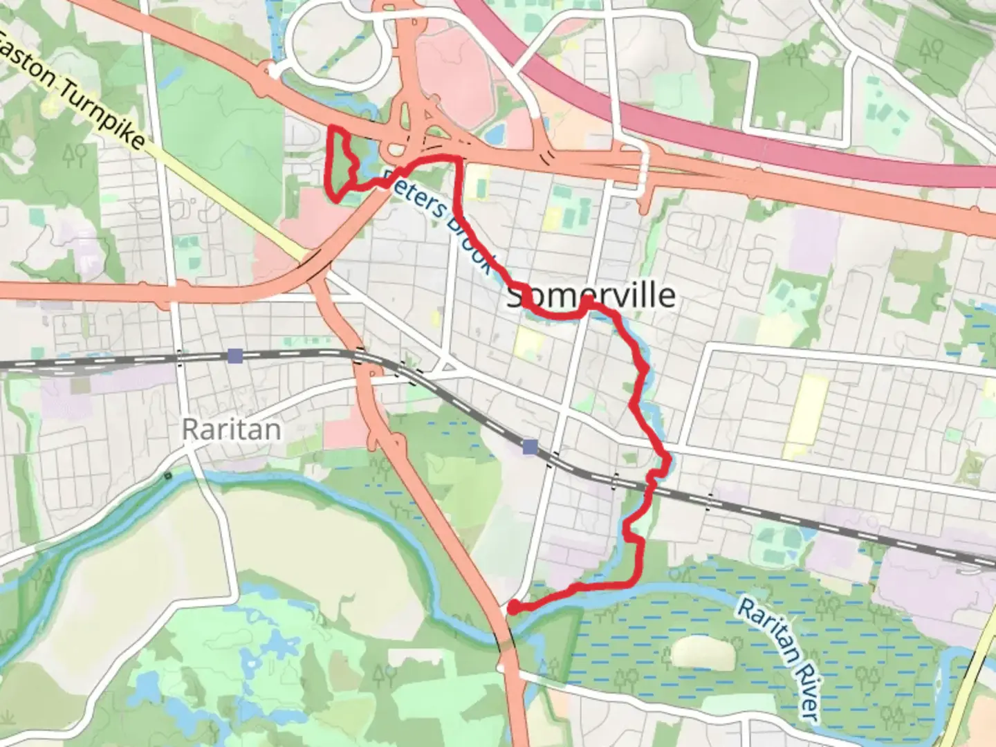 An image depicting the trail Peters Brook Greenway and its surrounding area.