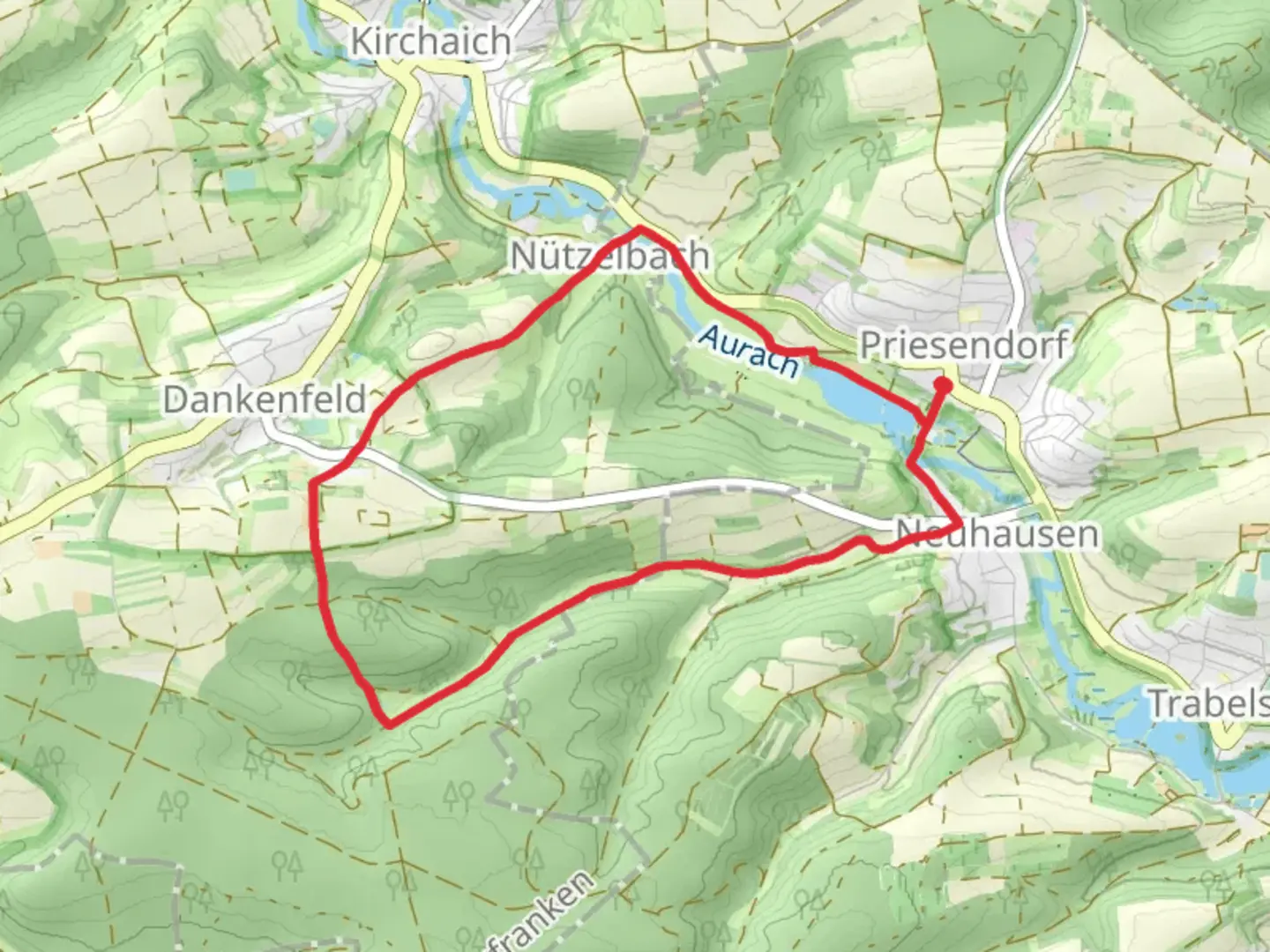 An image depicting the trail Priesendorf and Dankenfeld Loop via Priesendorfer Weiher and its surrounding area.