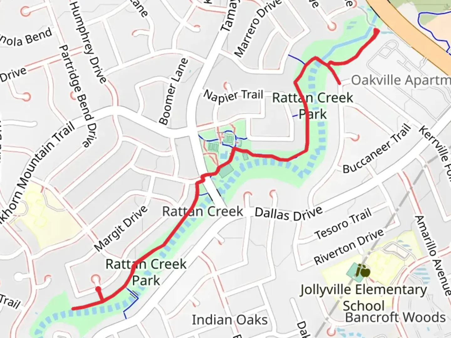 An image depicting the trail Rattan Creek Park and its surrounding area.
