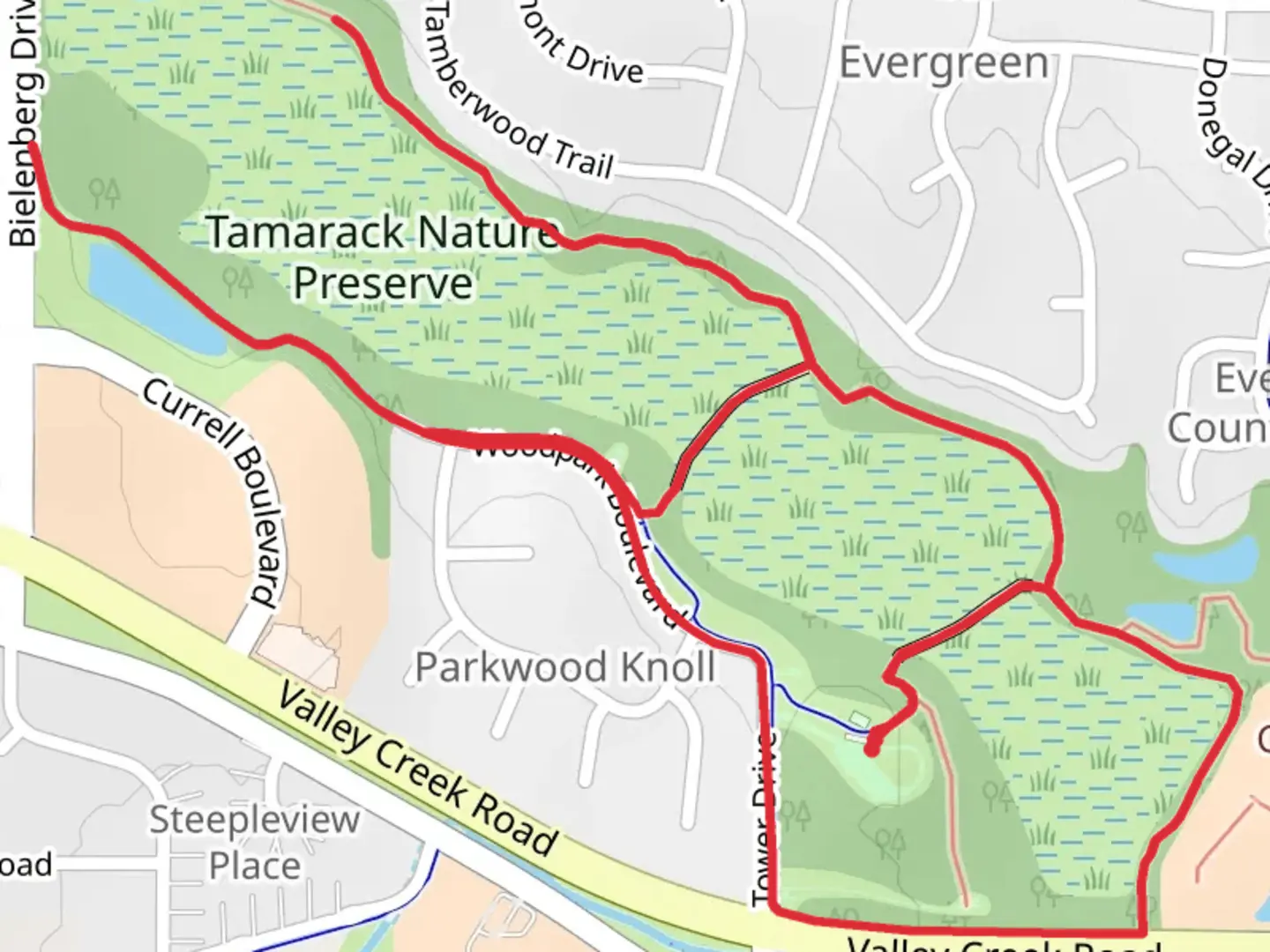An image depicting the trail Tamarack Nature Preserve Loop and its surrounding area.