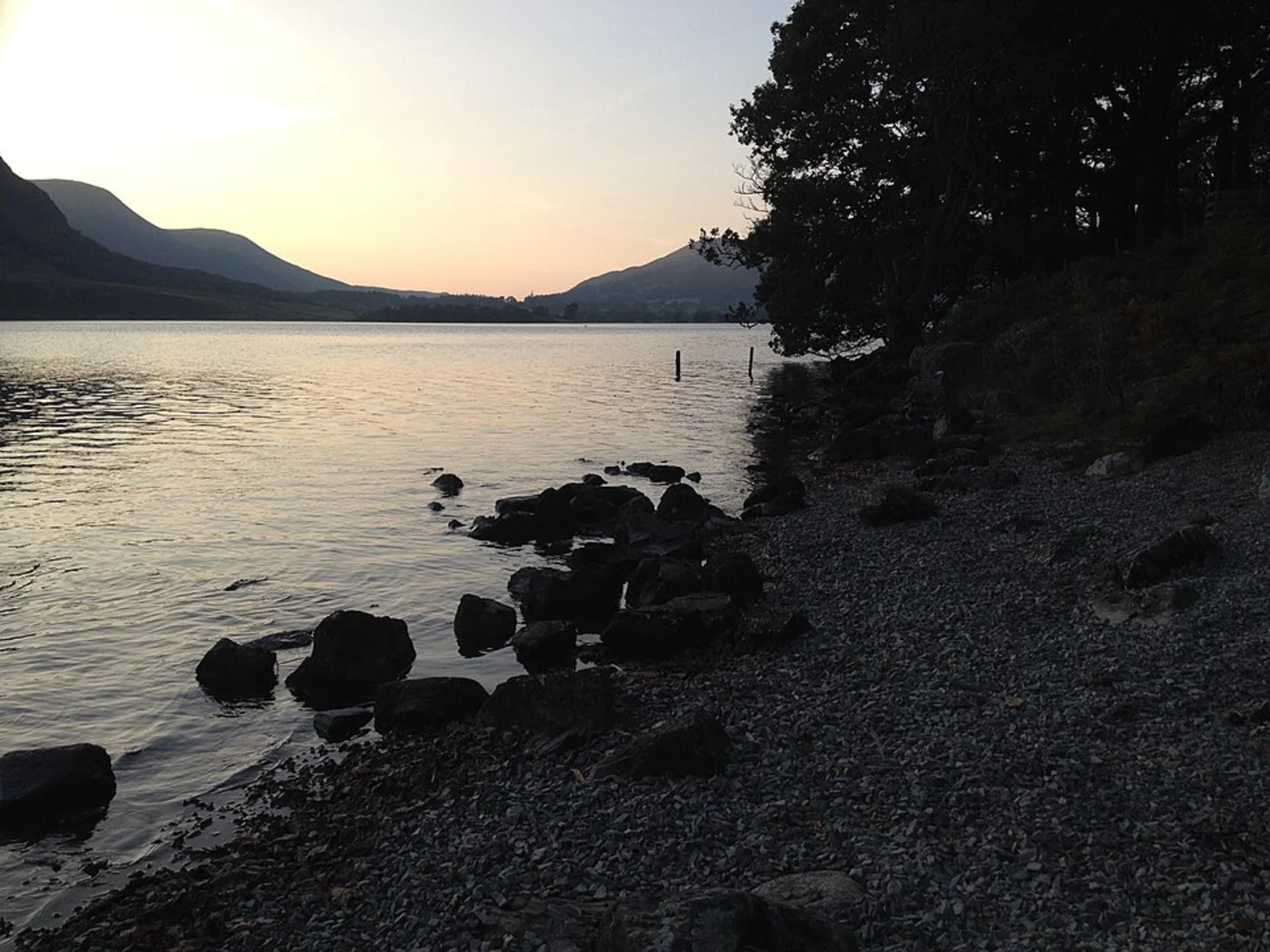 An image depicting the trail Holme Islands, Nether How and Buttermere Walk and its surrounding area.