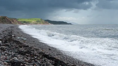 An image depicting the trail England Coast Paths - Northwest and its surrounding area.
