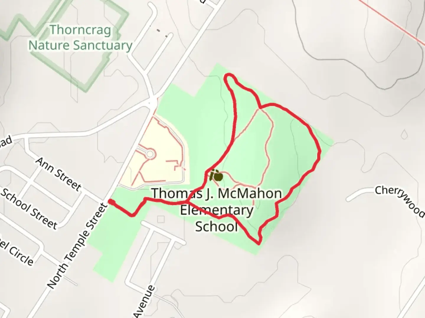 An image depicting the trail MACMHON GREEN TRAIL- UNPAVED PATH LOOP and its surrounding area.