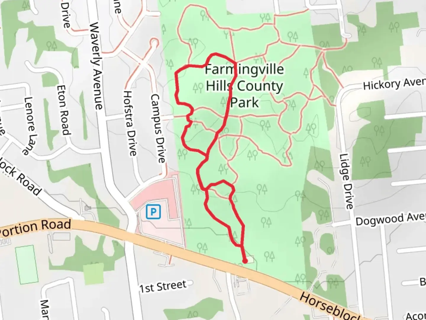An image depicting the trail Farmingville Hills County Park Short Loop Trail and its surrounding area.