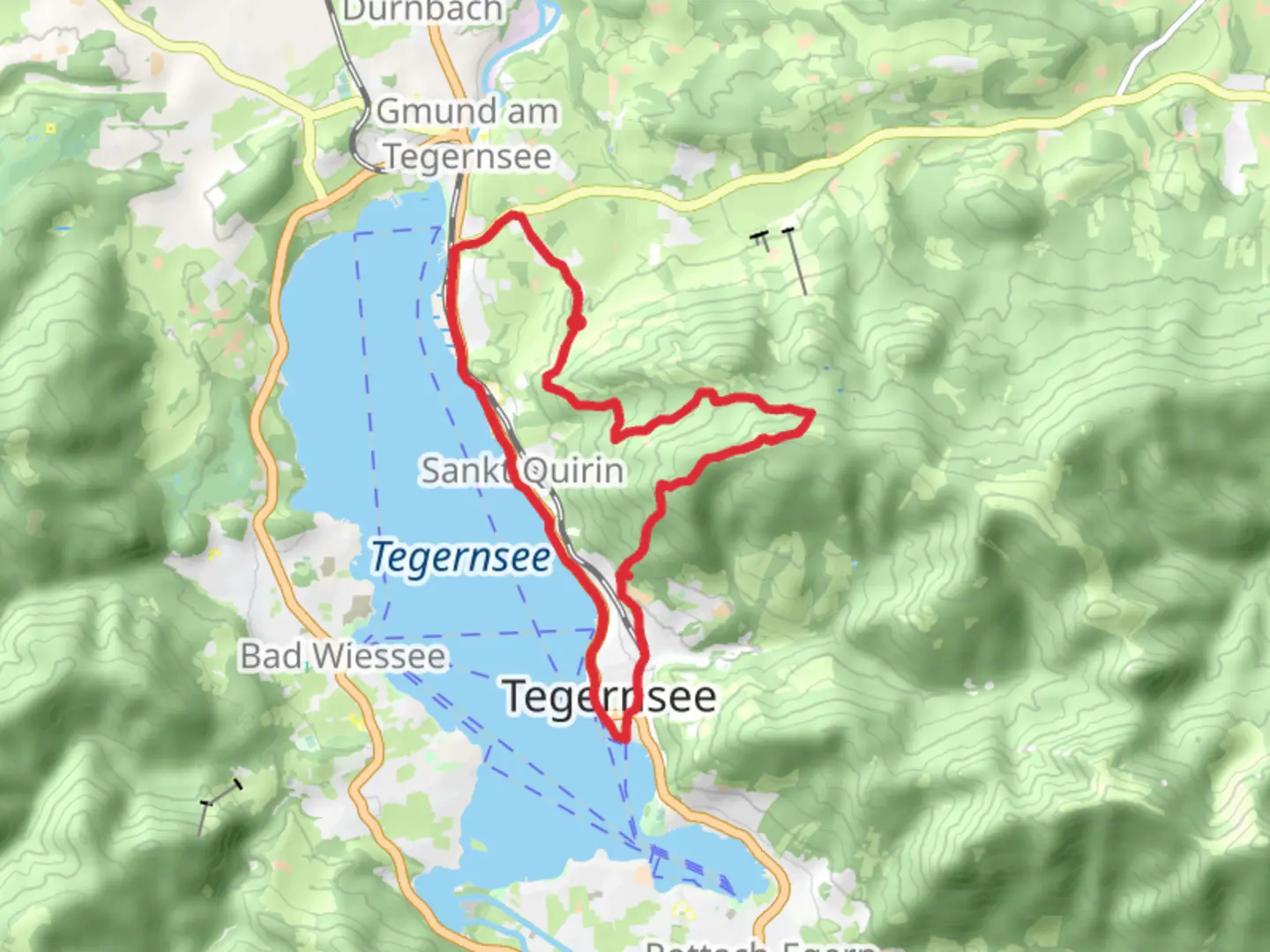 An image depicting the trail Tegernsee via Sommerweg and Die Alpenueberquerung Loop and its surrounding area.
