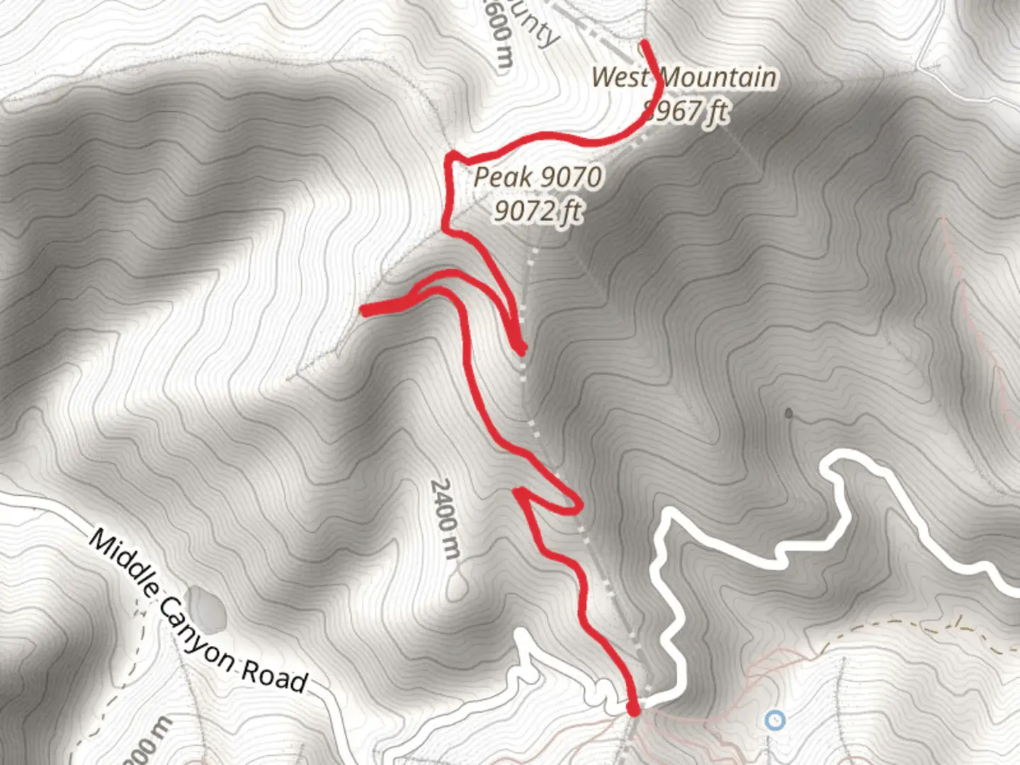 An image depicting the trail West Mountain voa Copper Pit Overlook Road and its surrounding area.