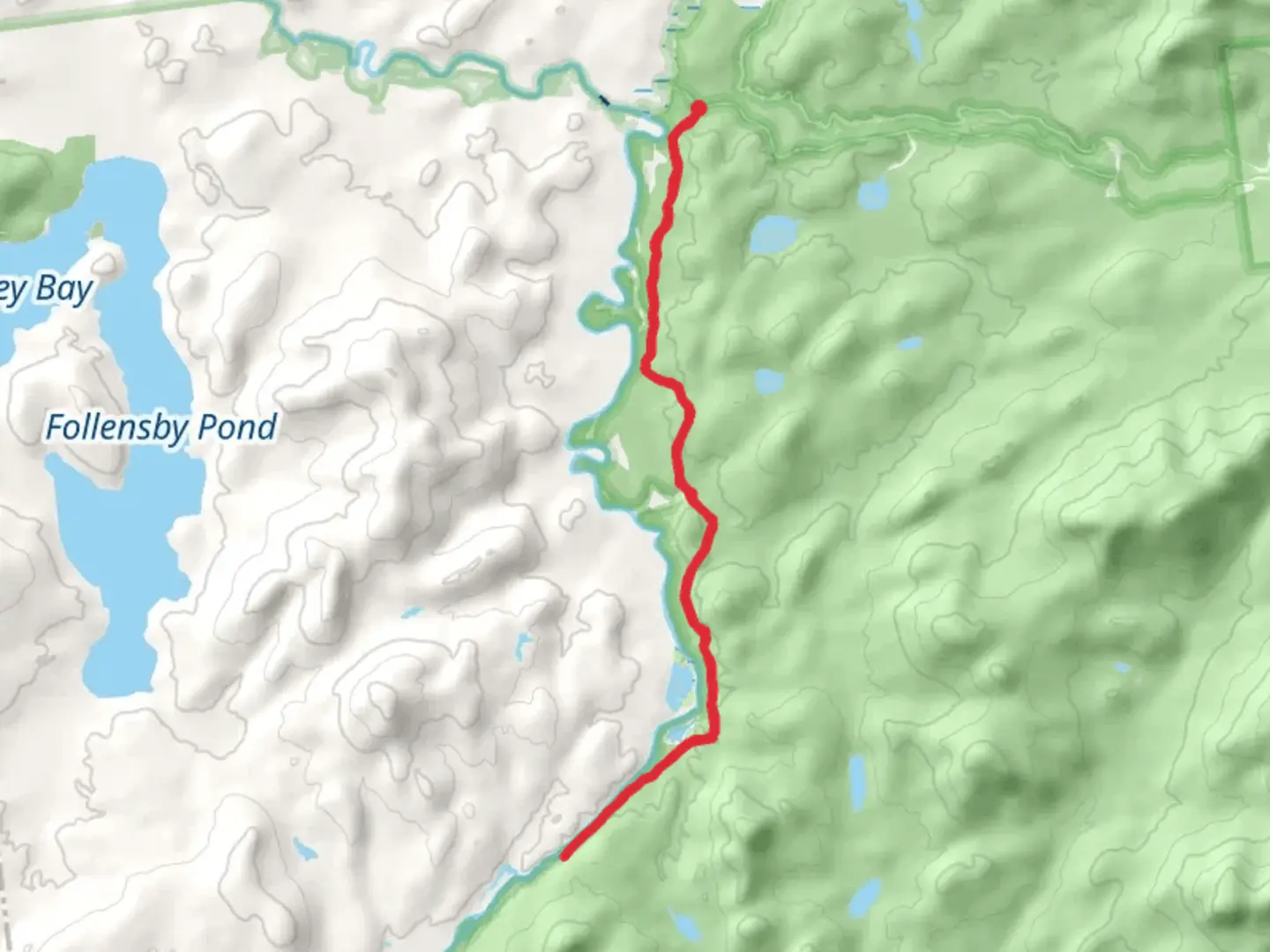 An image depicting the trail Raquette River from Ampersand Road and its surrounding area.