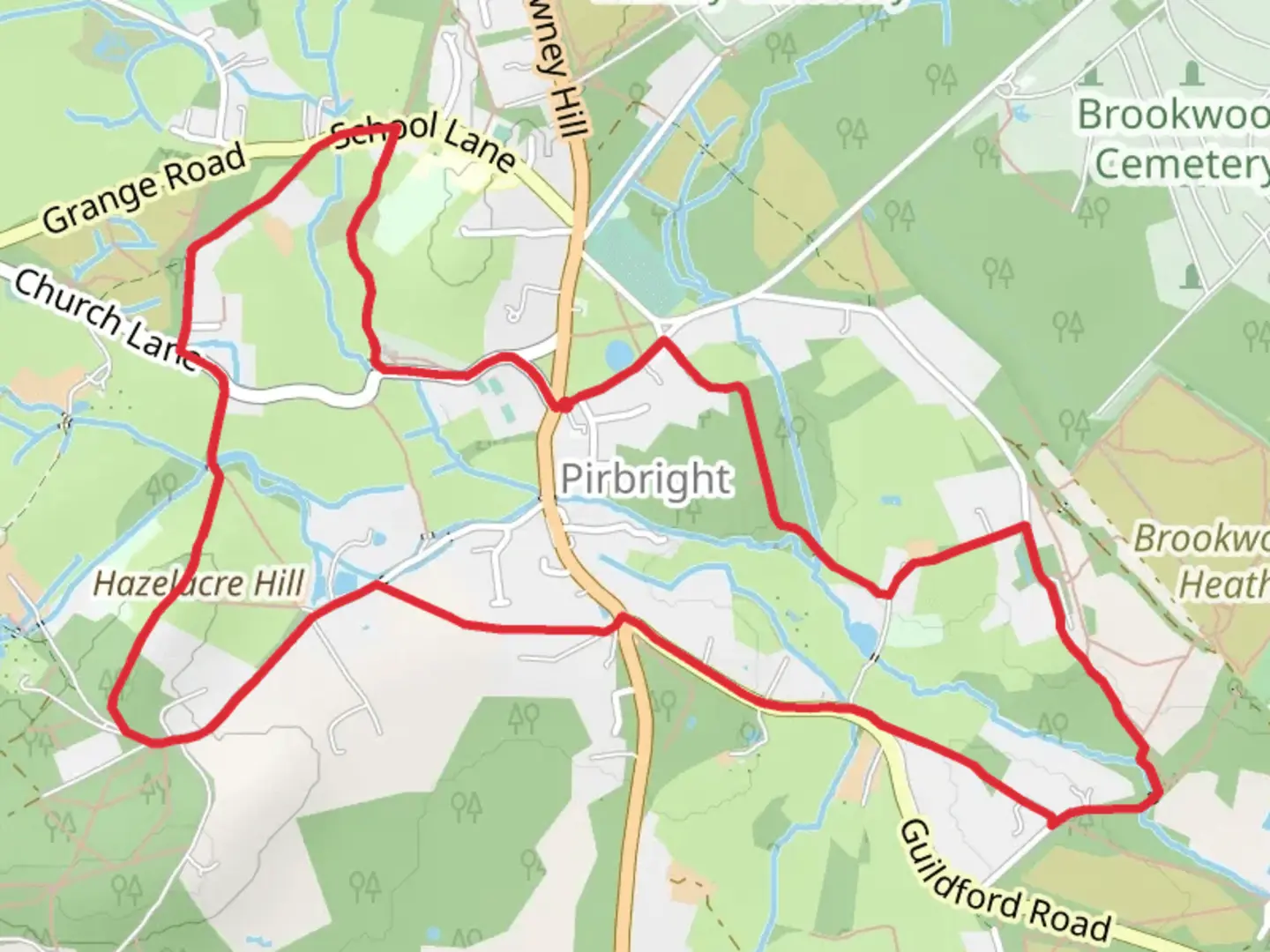 An image depicting the trail Hazelacre Hill Loop - Pirbright and its surrounding area.