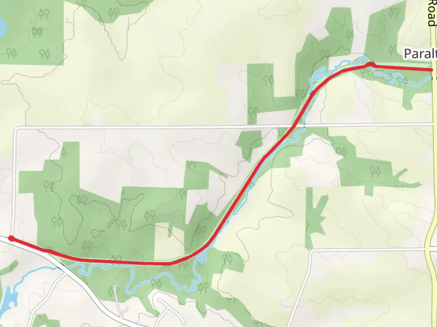 An image depicting the trail Grant Wood Trail - Creekside Road and its surrounding area.