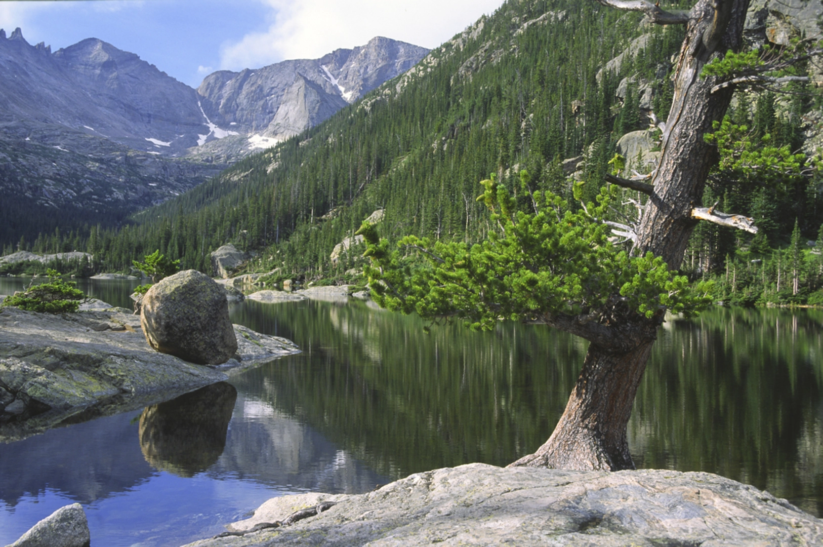 An image depicting the trail Mills Lake - Black Lake via Loch Vale Trail and its surrounding area.