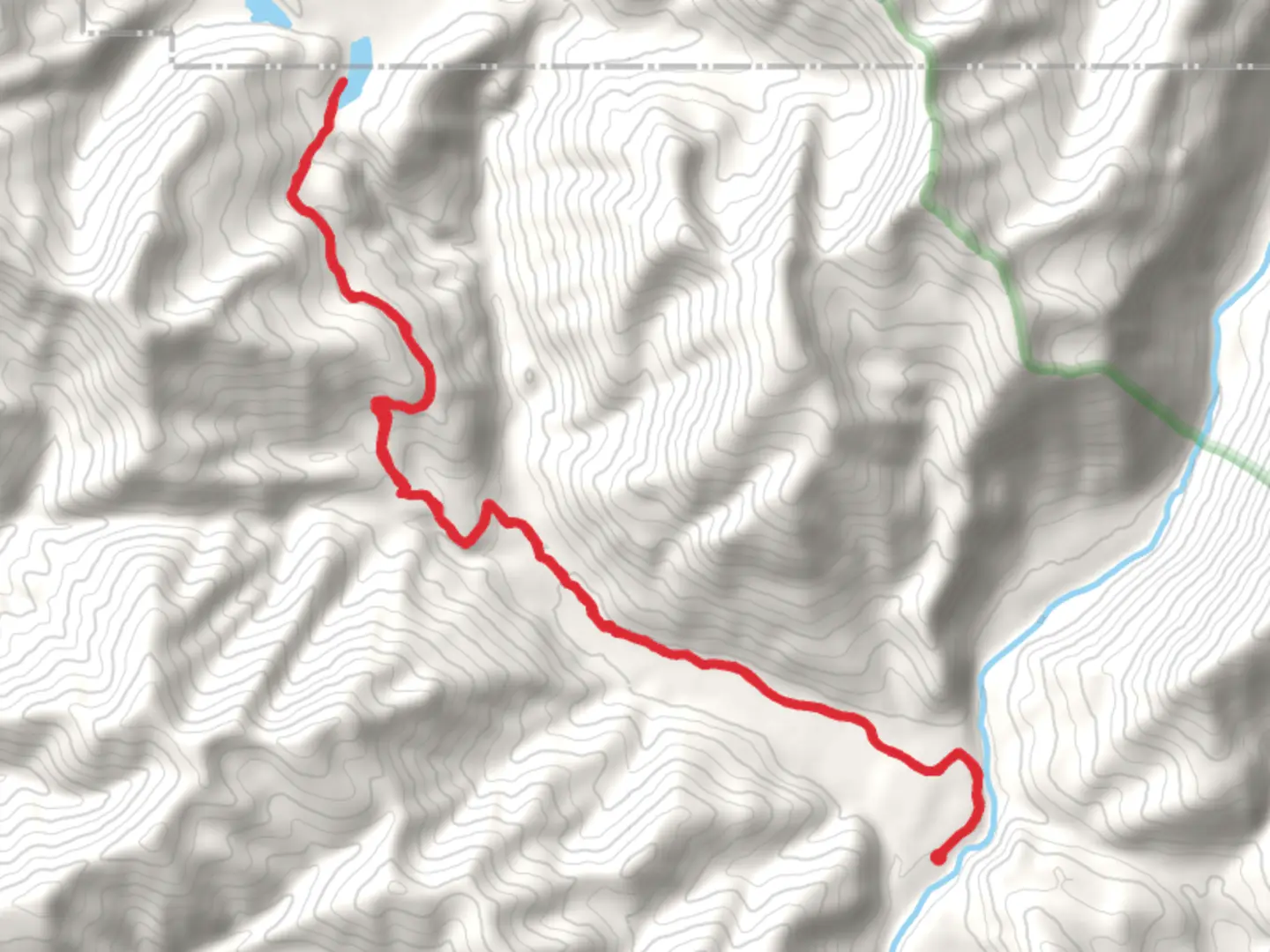 An image depicting the trail Lake Otatsy from Cooper-Blackfoot Road and its surrounding area.