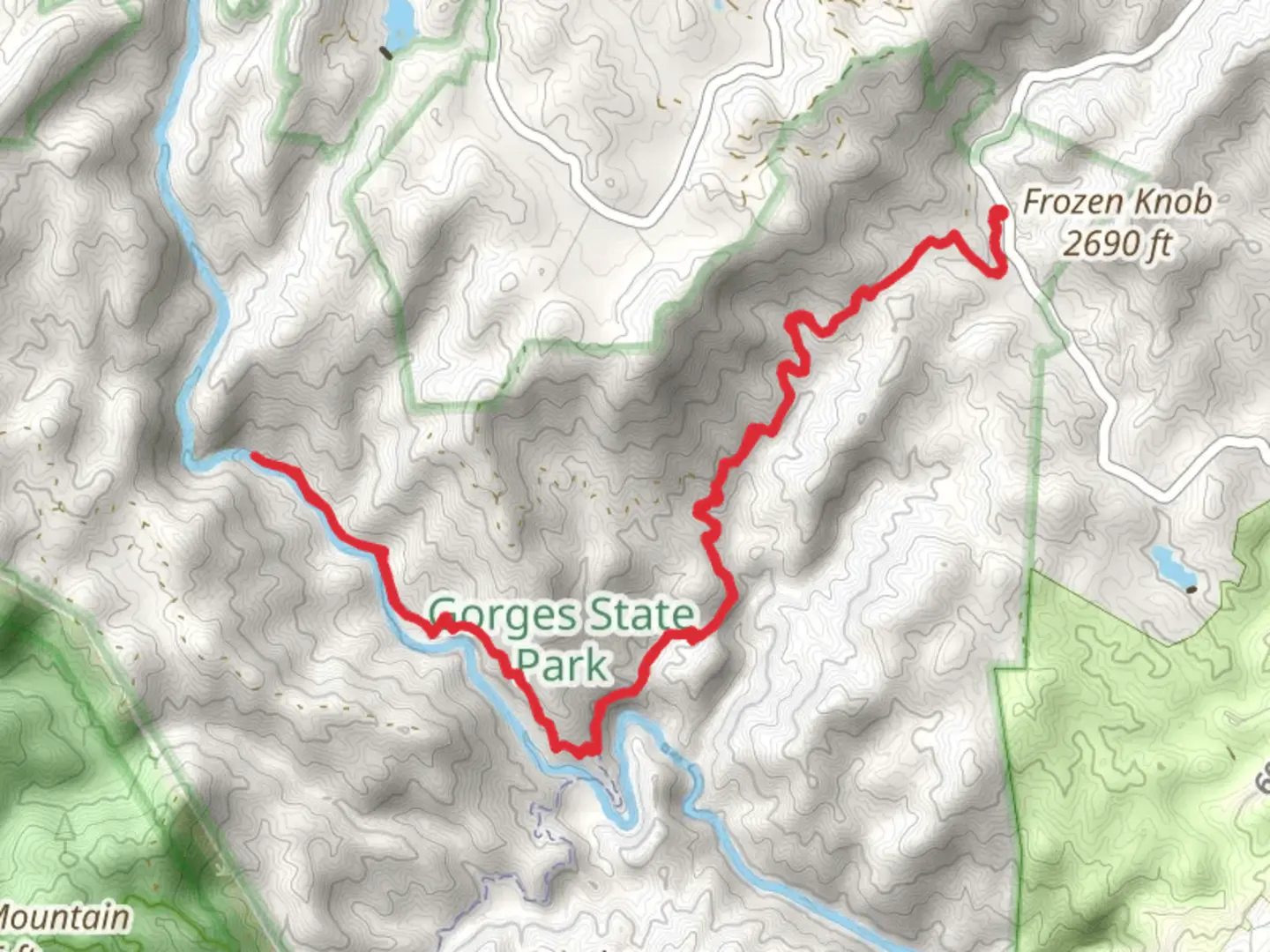 An image depicting the trail Toxaway River via Auger Hole Trail and its surrounding area.