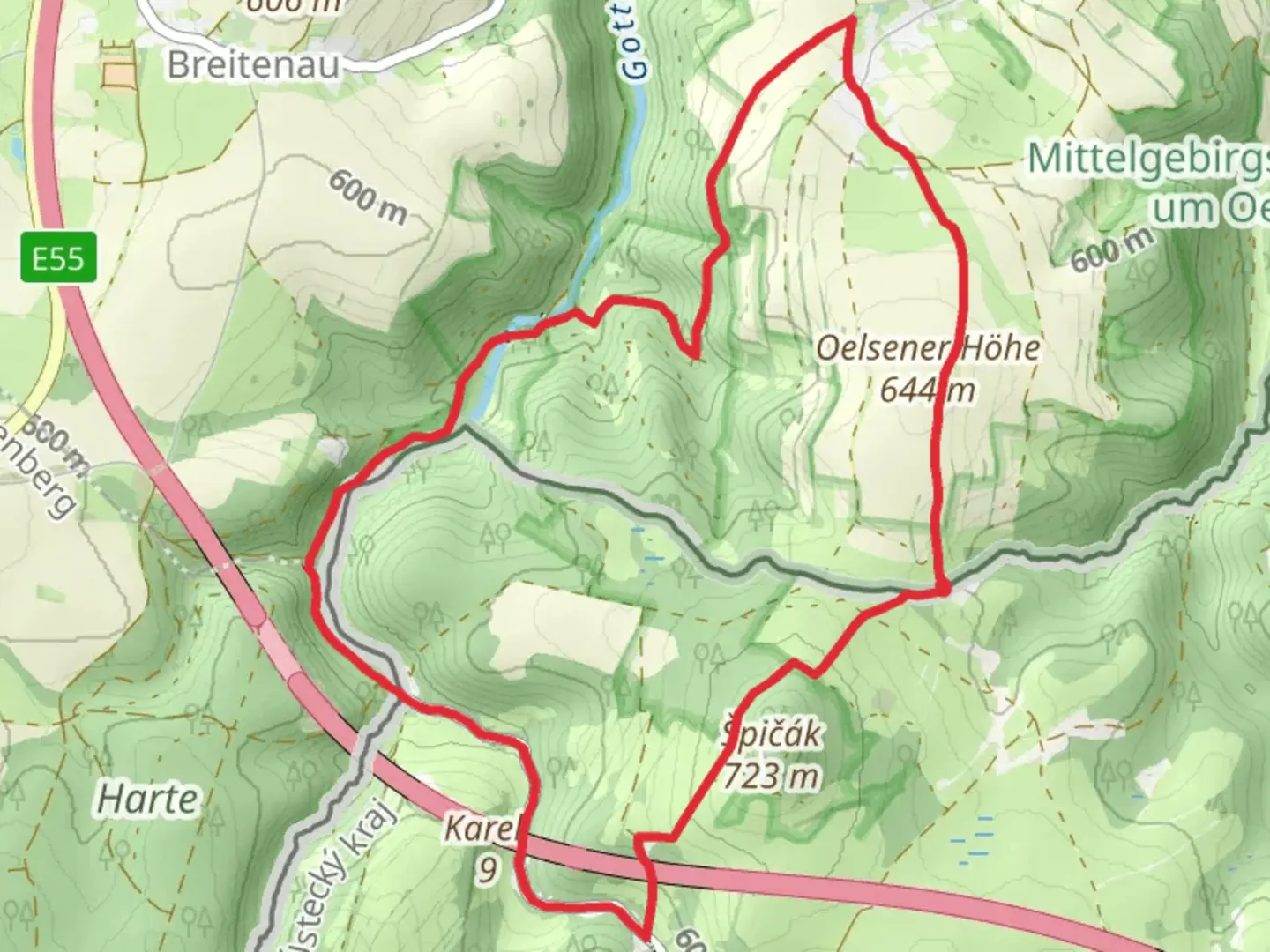 An image depicting the trail Oelsener via Okruh Oelsen - Špičák - Oelsen and its surrounding area.